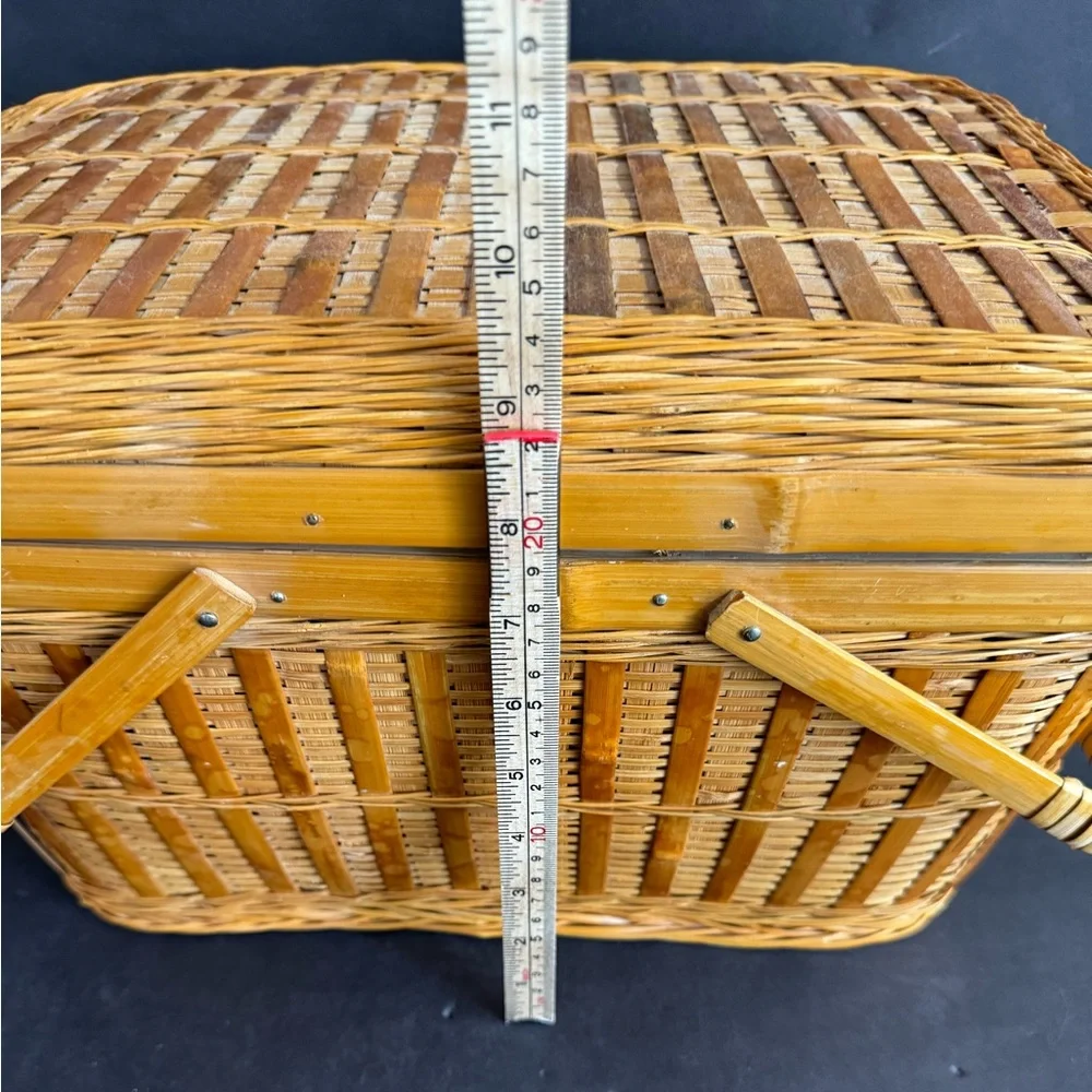 Large Vintage Handmade tan rattan picnic basket with handles.